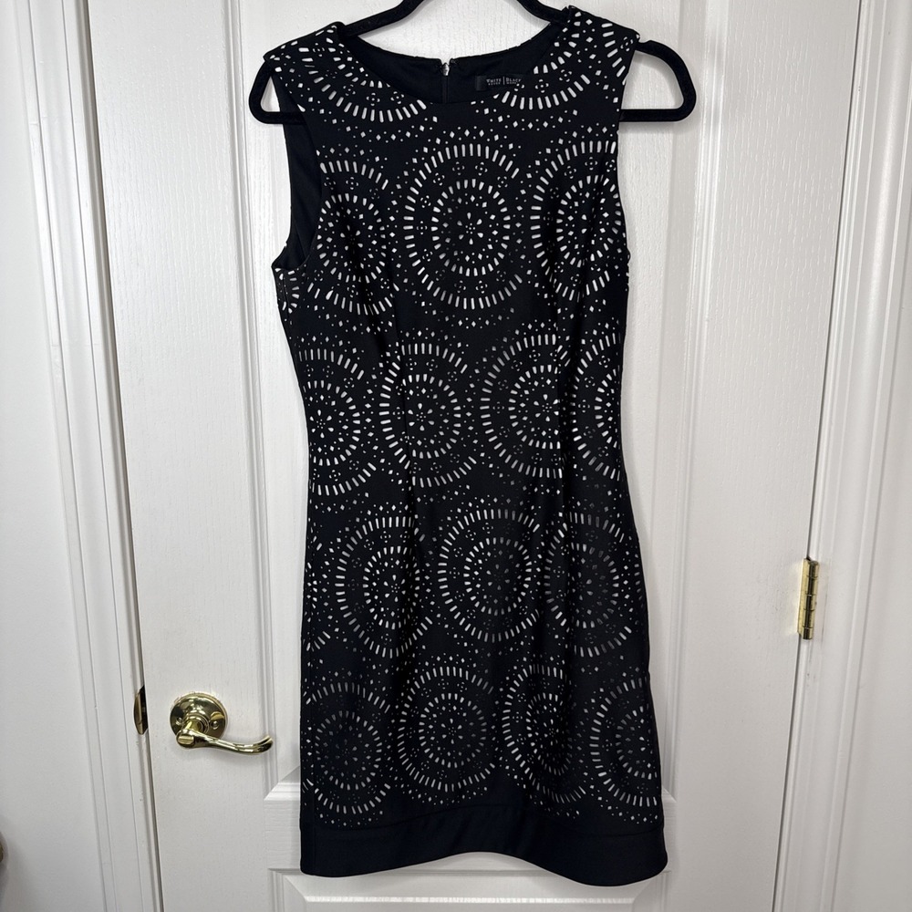 White House Black Market Size 4 Black Laser Cut Sleeveless Sheath Dress
